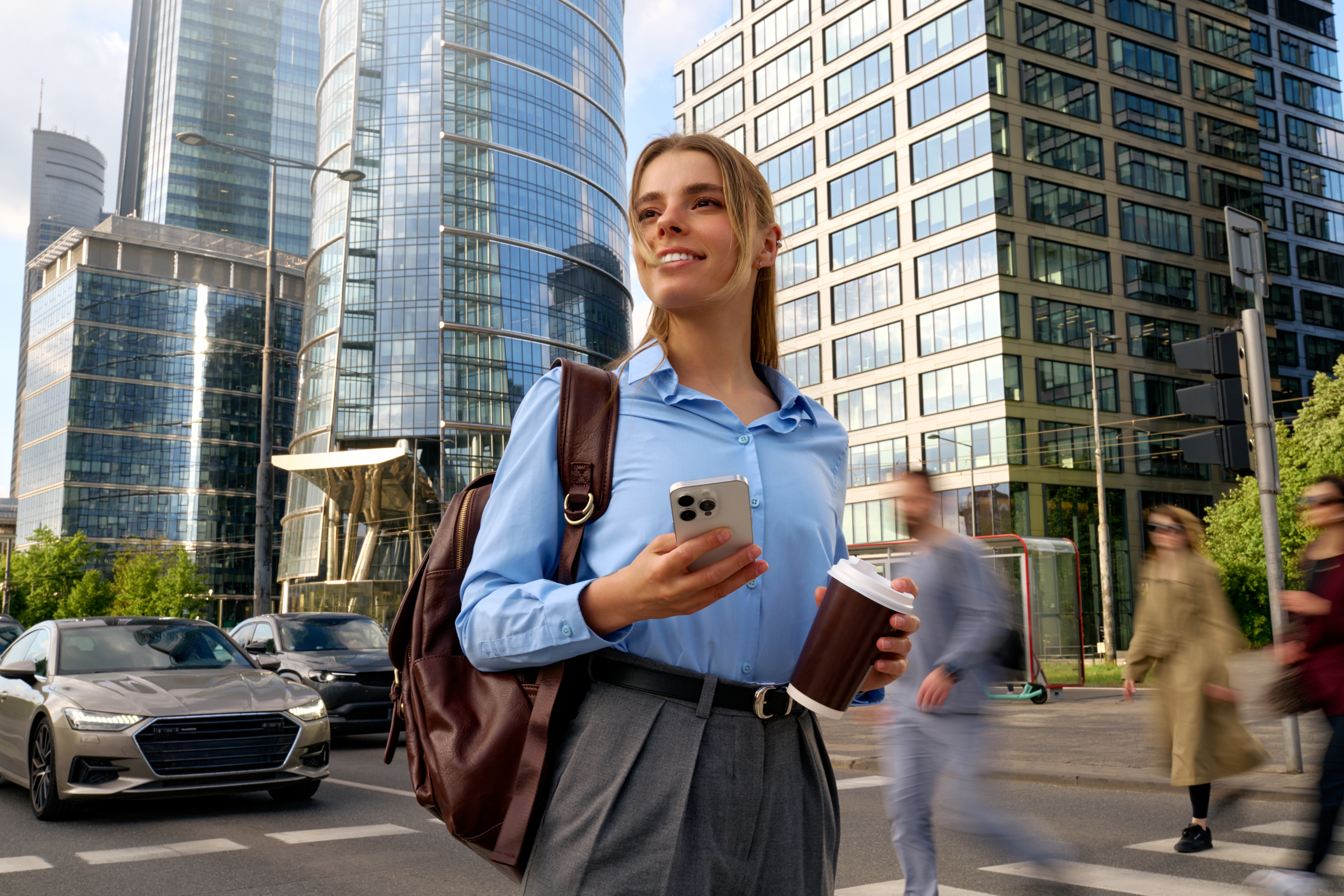 Young business professional looking confident and optimistic while working in the field.